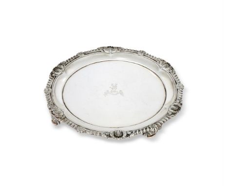 A LATE GEORGE III SILVER 10 INCH SHAPED CIRCULAR SALVER BY PAUL STORRLONDON 1811The raised gadrooned rim with anthemion on sh