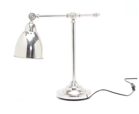 AN INDUSTRIAL STYLE TABLE LAMP
With adjustable head
Maximum extension: 53cm high
Condition: Minor signs of wear commensurate 