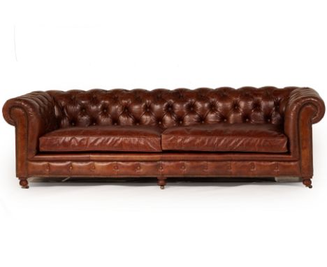 A TIMOTHY OULTON LEATHER CHESTERFIELD TYPE SOFA (2) Leather upholstered with button backs and arms 77cm high x 262cm long x 1