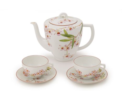 AN HERMES 'JARDIN DES ORCHIDEES' PART TEA SERVICE
Comprising: a teapot (repair to spout) and two pairs of cups and saucers
Th