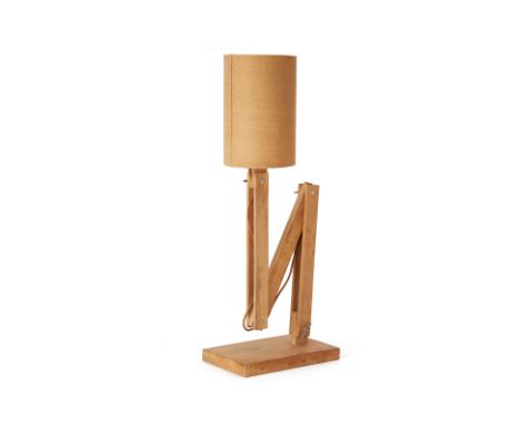 AN ADJUSTABLE FOLDING WOOD TABLE LAMP
With shade, untested
84cm high including shade
Condition: Some environmental wear to th