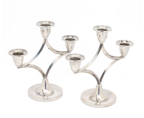 A PAIR OF ENGLISH SILVER PLATED THREE LIGHT CANDELABRA
Sheffield, circa 1950/70, marked to base, of openwork design
17.5cm hi