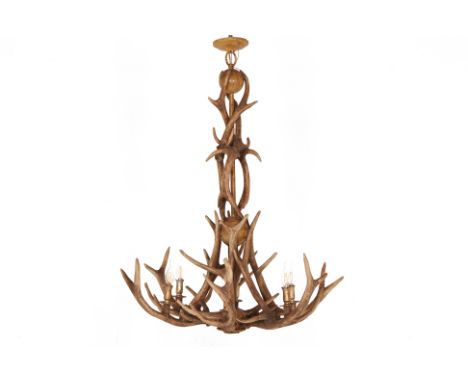 A TIMOTHY OULTON ANTLER SIX-LIGHT CHANDELIER
Composed of intertwining deer antlers
92cm in diameter; 110cm tall
Condition: Mi