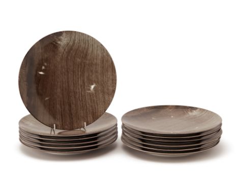 A SET OF TWELVE BERNARDAUD LIMOGES WOOD PATTERN PLATES
Printed with wood grain design
30cm diameter
Condition: Some wear to t