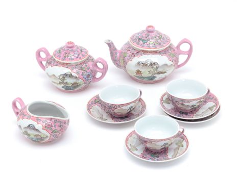 A CHINESE PART TEA SERVICE
Pink ground, decorated with panels of mountainous scenes and pagodas
Plates measure 14cm diameter
