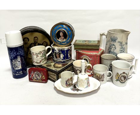 A collection of commemorative ware including tins, mugs, bell, dish, flask, jugs etc 