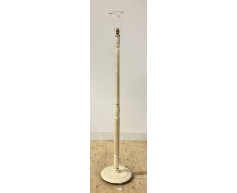 A cream painted turned lamp standard with fluted column and circular base, H150cm
