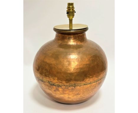 A Middle Eastern soldered two-section copper hammered cooking pot with later brass mounted light fitting (32cm x 30cm)