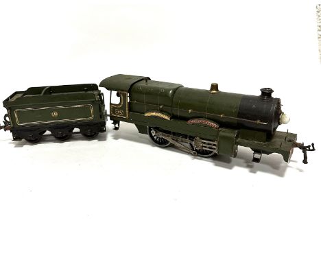 A Hornby series by Meccano GWR engine, Caerphilly Castle complete with tender, in green and gold livery, (steam engine: 9cm x