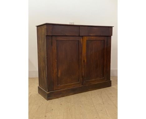 A Victorian mahogany side cabinet, fitted with two frieze drawers over two doors enclosing a shelf, H93cm, W107cm, D37cm