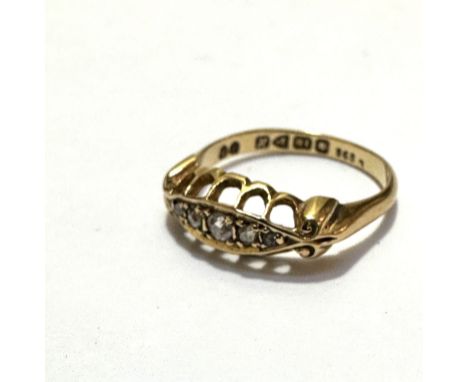 An 18ct gold five stone old mixed cut diamond ring mounted in channel setting, size K, weighs 2.5g