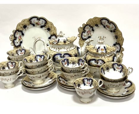 A Victorian china twenty eight piece tea and coffee service, including two cake plates, a bread plate, a sugar basin, a sucre