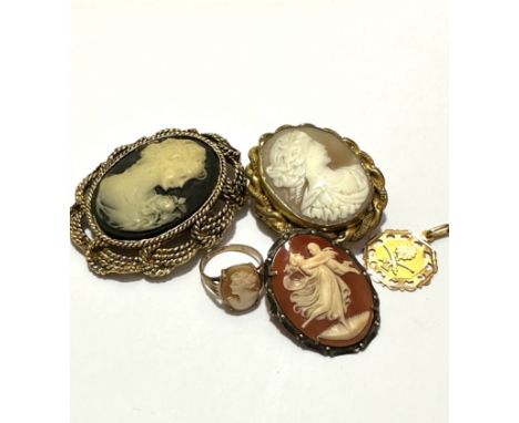 A 9ct gold oval shell carved cameo set ring, an Eastern openwork octagonal pendant with palm tree  design, an Edwardian shell