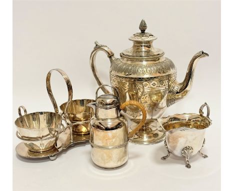 An Epns two-division milk jug and sugar basin stand complete with a Jersey cream can with raffia handle, an Edwardian engrave