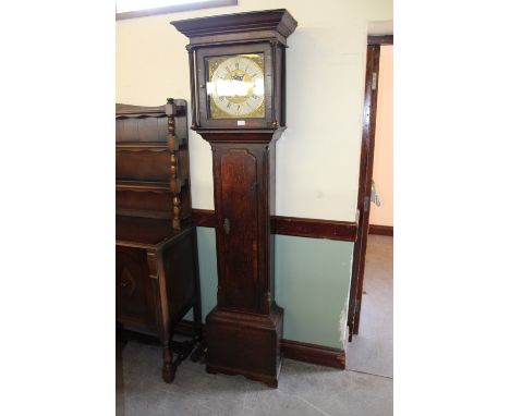 An 18th Century oak longcase clock, the 31cm brass dial marked J. Lawson of Bradford, 203cm high(movement, dial and case poss
