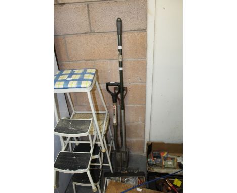 Trio of garden tools, spade, fork and rake