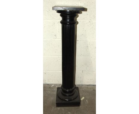 An ebonised wood fluted architectural column, 107cm high. 