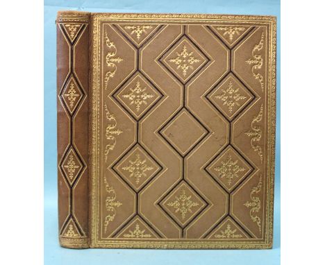 A Victorian leather-bound album of photographs and ephemera, photographs include news of Torquay, Matlock, Eton, Fountains Ab