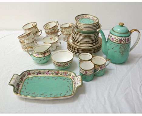 AYNSLEY PART COFFEE SERVICEthe duck egg green ground with a floral border and gilt highlights, signed N. Webster to the under