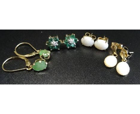 FOUR PAIRS OF GEM SET EARRINGScomprising a pair of emerald and diamond cluster stud earrings in ten carat gold; a pair of gre