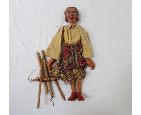 CHILD'S VINTAGE STRING PUPPETmodelled as a lady with a carved wooden head and limbs, 48cm high 