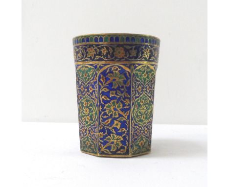 ENAMEL DECORATED PERSIAN CUPthe octagonal cup with profuse floral and motif decoration, with gilt interior, 10.2cm high 
