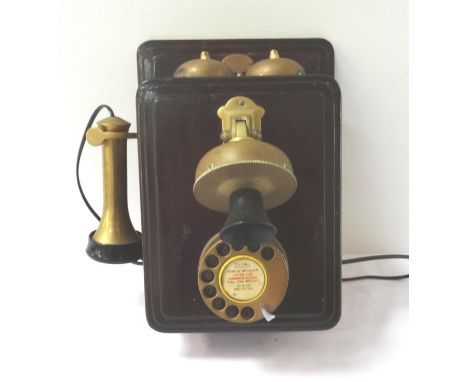 SIEMENS STAINED PINE VINTAGE WALL MOUNTED TELEPHONEwith two bell ringer, separate brass mouth and earpiece with a circular br