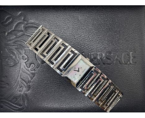 Versace. A stainless steel ladies wristwatch, with rectangular mother-of-pearl dial, Roman numeral and baton dial, on articul