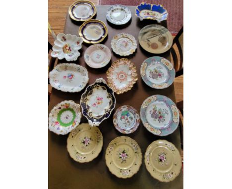 Eighteen plates and dishes including Spode, Royal Doulton Davenport, Royal Crown Derby, and a David Eeles Pottery dish of a H
