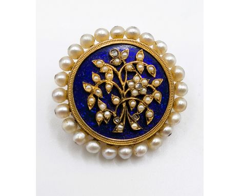 A late 19th century Victorian seed pearl and diamond brooch, of circular form, the cobalt blue guilloche enamel ground decora