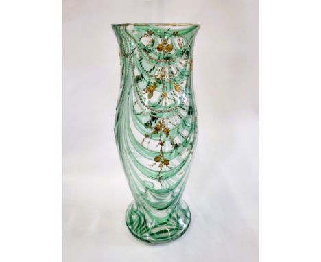 An early to mid 20th century Bohemian green and clear glass vase, decorated with applied gilt and pink enamel floral and swag