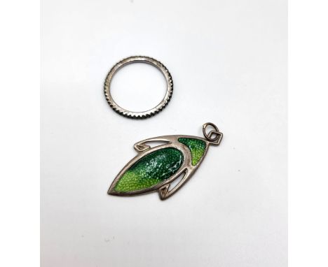 An Art Nouveau silver and enamel pendant, of elongated form, decorated with light and dark green enamel, makers mark RJW and 