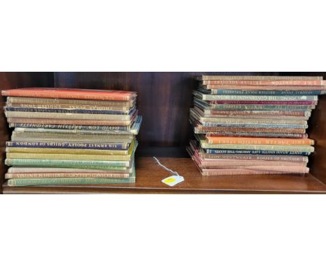 A group of vintage books including publications by Guy Paget, David Low, Rex Warner, Thomas Burke, etc. 