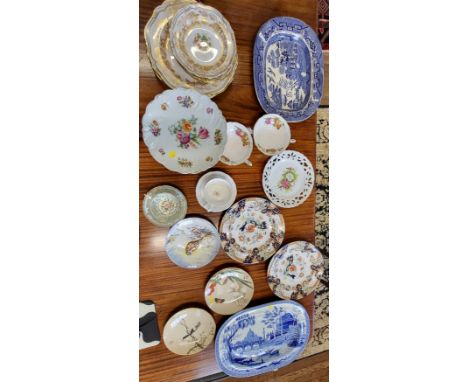 A Spode blue and white platter, 42cm, a Davenport blue and white platter, 33.5cm, a German porcelain cake stand, two Spode so