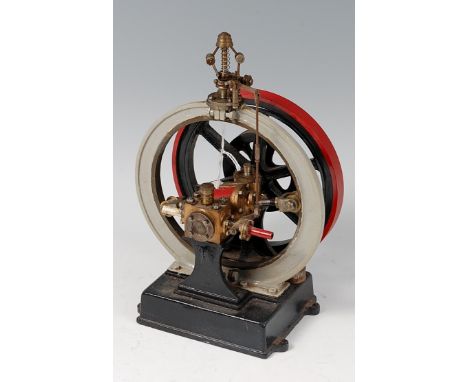 An unmarked but proprietary made steam engine, having steam inlet and outlet connections, inlet controlled by a ball type gov