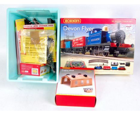 A Hornby R1121 Devon Flyer set with 0-4-0T and 3 wagons, trakmat etc (M,BNM) and various accessories including extra track, 4