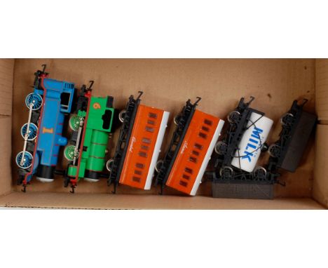 A Hornby Thomas the Tank Engine 0-6-0T, a Percy 0-4-0ST, 2x 4 wheelcoaches (Annie and Clarabel) 2 troublesome trucks and a Ti