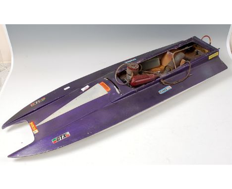 A petrol engined model hydroplane racing boat, single engine, single screw, VECO 61 engine needs attention