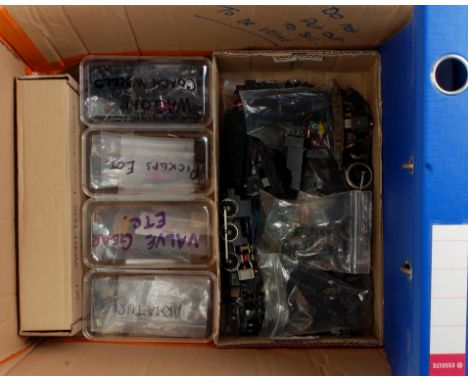 A large quantity of locomotive components, including chassis, motors, bogies, valve gear, pick ups, wheels etc, together with