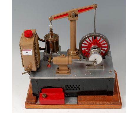 A wooden cased model of a beam engine powered by a stirling cycle hot air engine with spirit burner beneath large cylinder 13