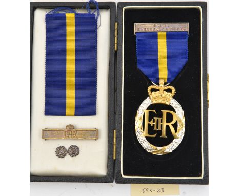 Army Emergency Reserve Decoration,  EIIR, reverse dated 1953, together with additional clasp dated 1953 and 2 silver rosette 