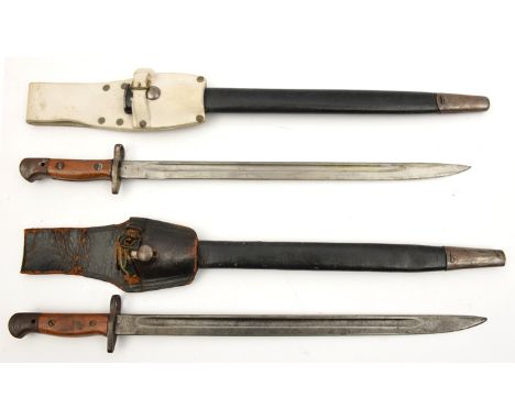 A 1907 pattern SMLE bayonet, in its scabbard with white buff leather frog; another similar with black leather frog (strap AF)