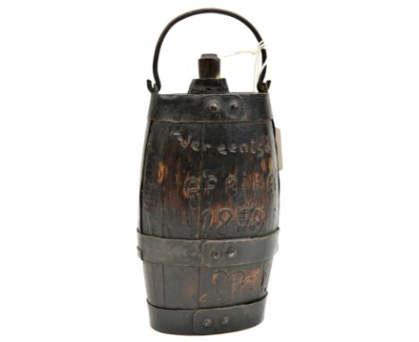 A very unusual Boer War bottle,  barrel shaped wood body, metal bound, carved with “Holland En Transvaal Vereenied Afrika 189