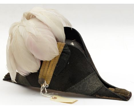 A staff officer’s cocked hat, bullion tassels fore and aft, staff pattern lace loop, braided ball  button, white over red fea