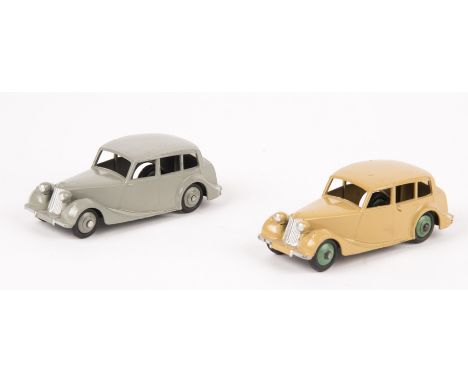 2 Dinky Toys Triumph 1800 Saloon (40b). An example with fawn body and green wheels. Together with an example with grey body a