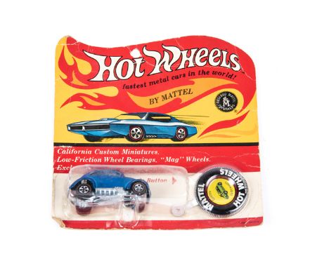 A scarce 1969 issue Mattel HotWheels ‘Californian Custom Miniatures’ Custom Volkswagen. Finished in vacuum plated blue. Still