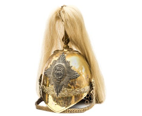 An 1871 pattern officer’s helmet of the Carabiniers, 6th Dragoon Guards, gilt skull, silvered badge complete with its white h