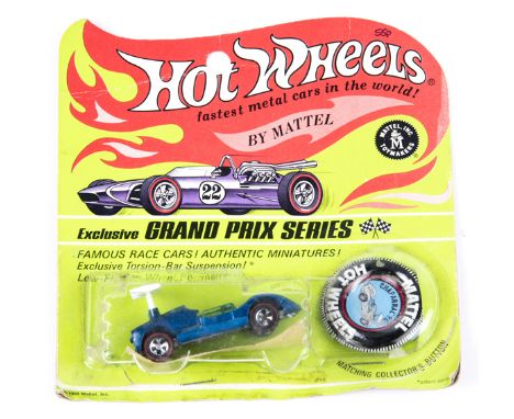 A scarce 1969 issue Mattel HotWheels ‘Exclusive Grand Prix Series Chaparral 2G. Finished in vacuum plated blue. Re-sealed nea