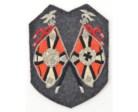 A scarce Third Reich Luftwaffe Standard Bearer’s bullion embroidered arm patch,  on dark grey cloth backing. GC              