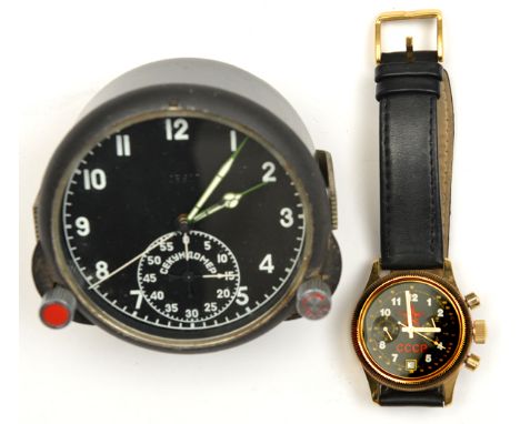 A Soviet Russian Paljot chronometer wristwatch,  number 00099 of 10000, with leather strap; and a clock from a Soviet Russian